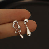 Asymmetrical Liquid Metal Drop Earrings Silver